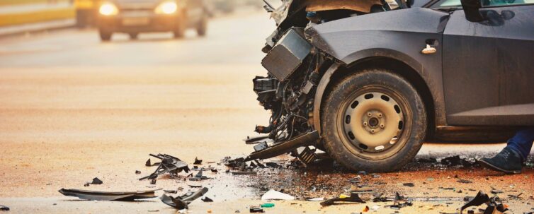wrecked car on a highway