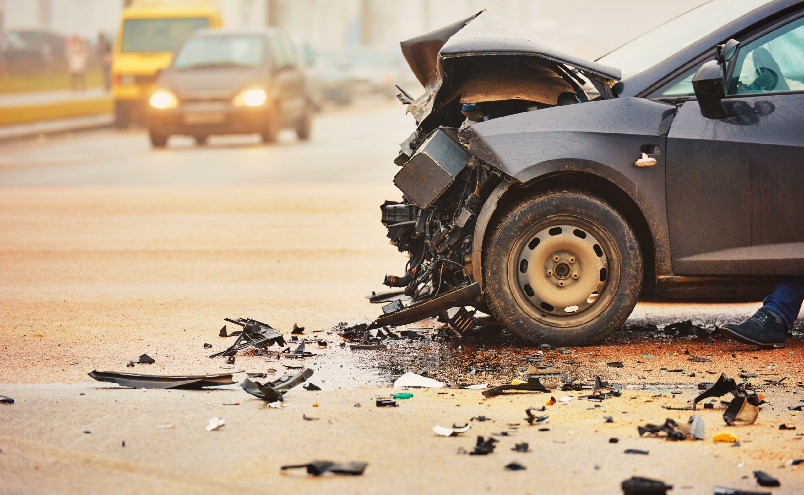 wrecked car on a highway