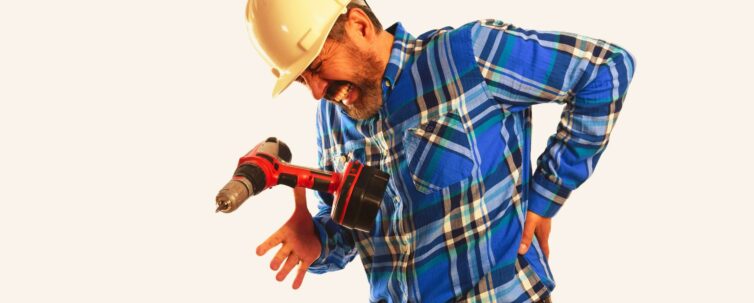 Hispanic worker getting injury to lower back