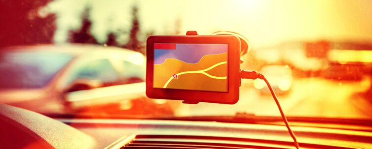 GPS car navigation system mounted in car windshield