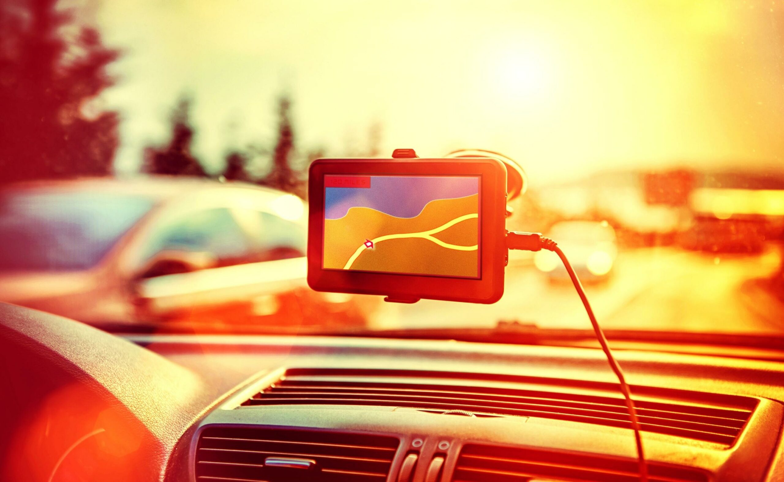 GPS car navigation system mounted in car windshield