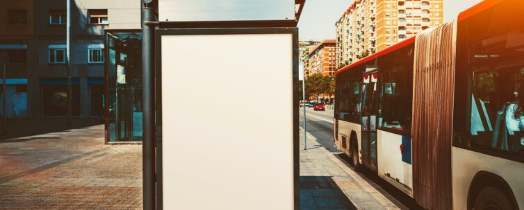 empty poster mock up on the outer side of a bus stop