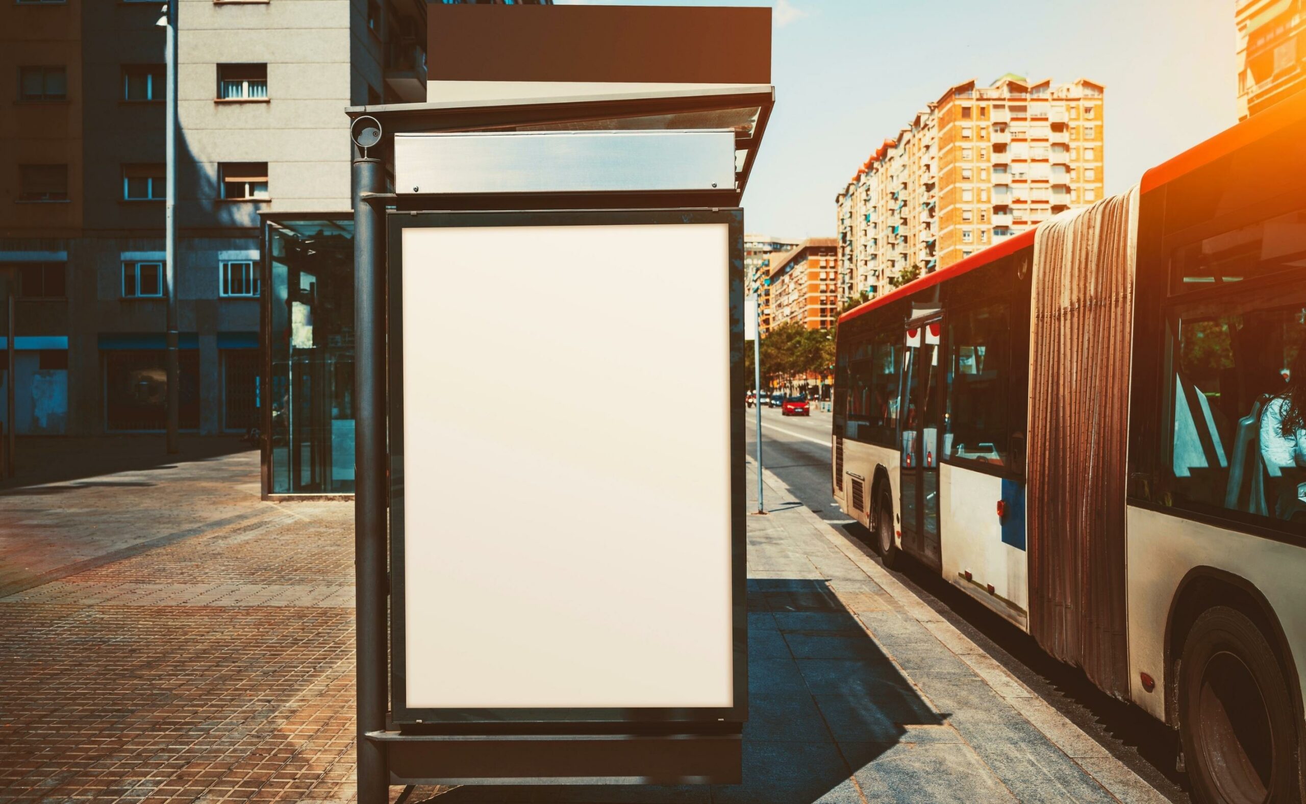 empty poster mock up on the outer side of a bus stop