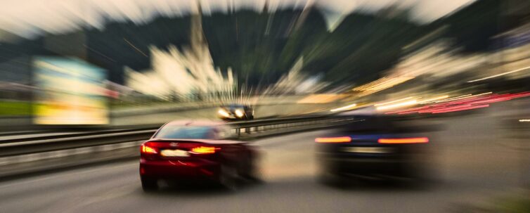 evening city street racing cars blurred motion