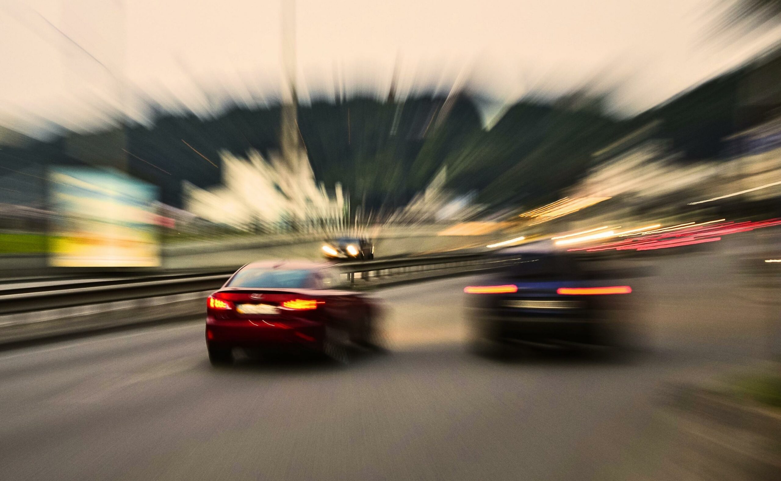 evening city street racing cars blurred motion