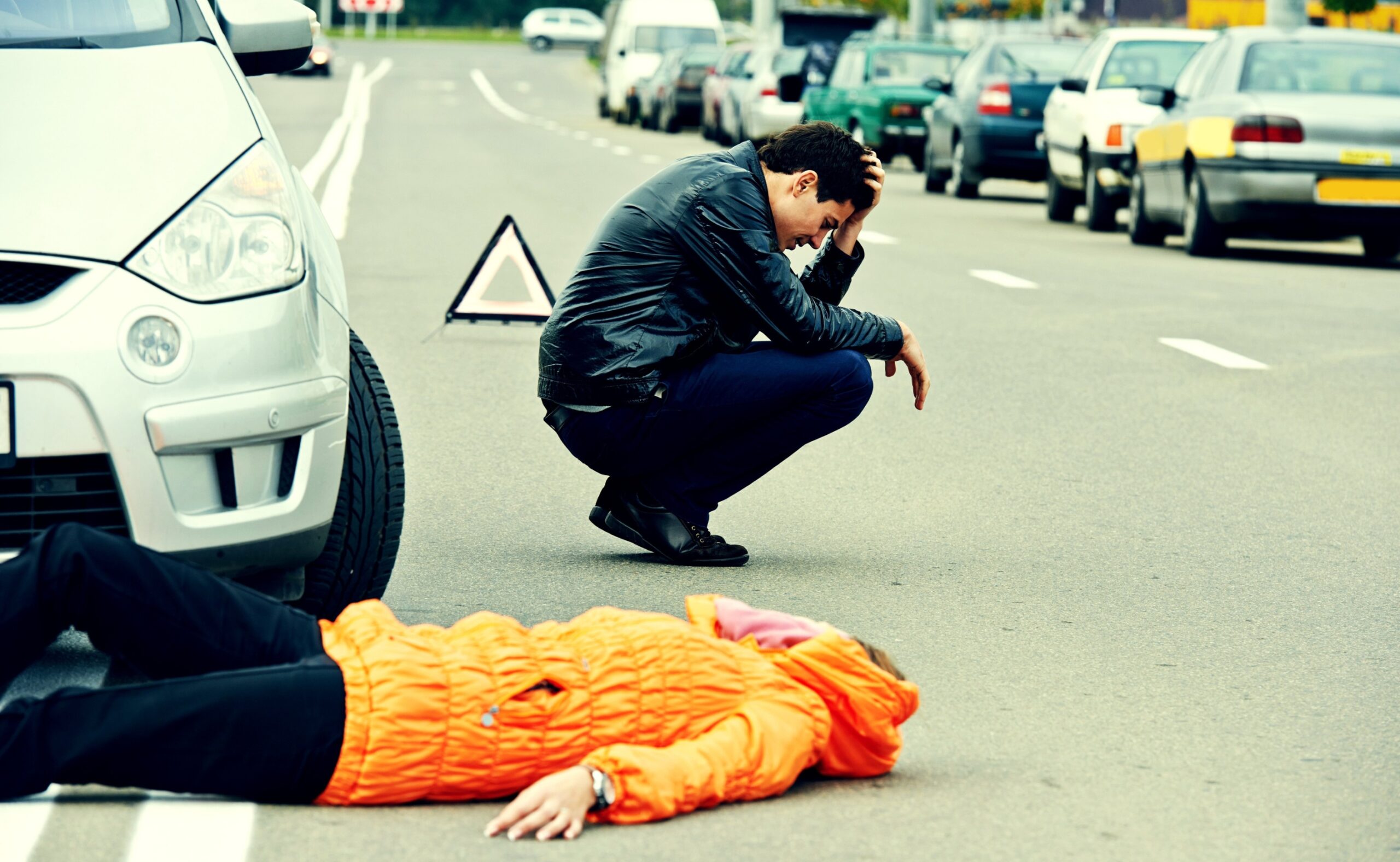 knocked down pedestrian and upset driver in front of an automobile crash car collision