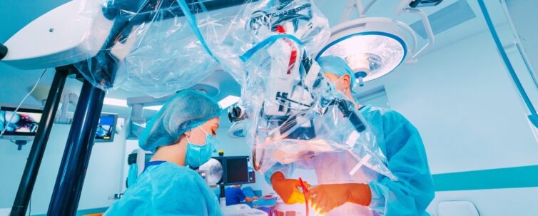 neurosurgeon is operating with medical robotic surgery machine