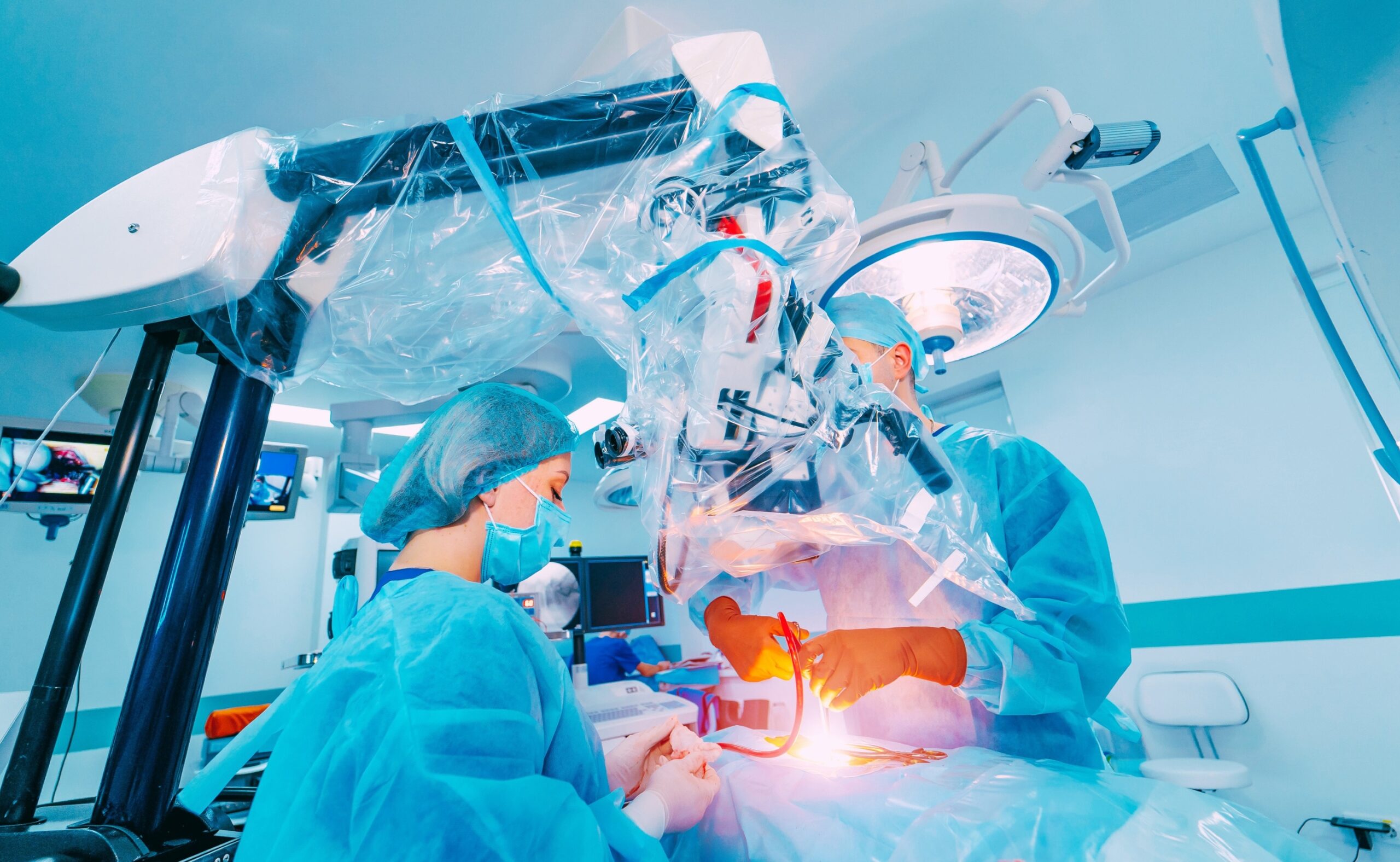 neurosurgeon is operating with medical robotic surgery machine