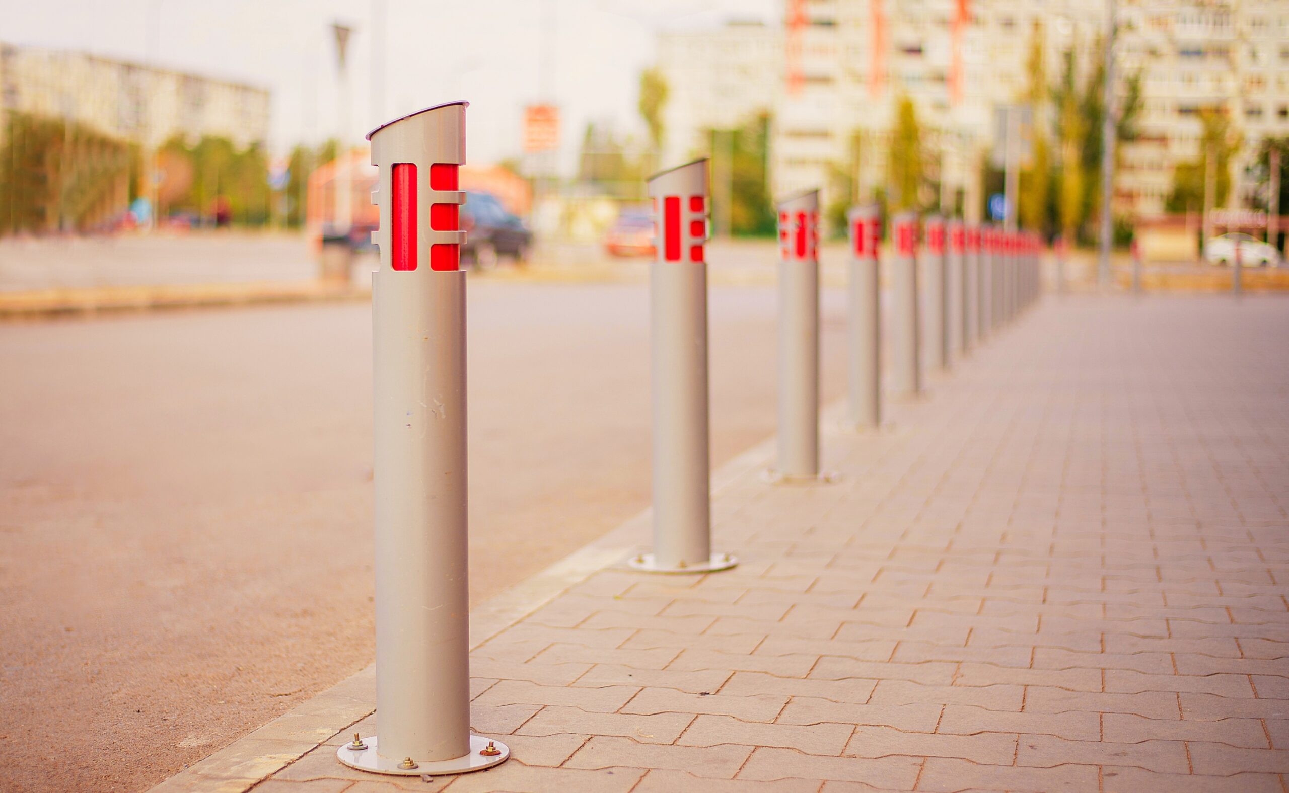Metal fence on the street for the safety of the pedestrians from cars