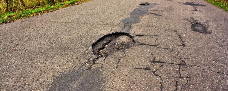 dangerous road with holes