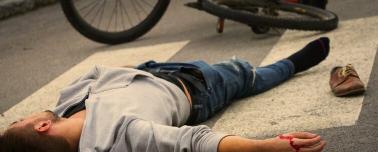 Bicycle accident. man hit by a car