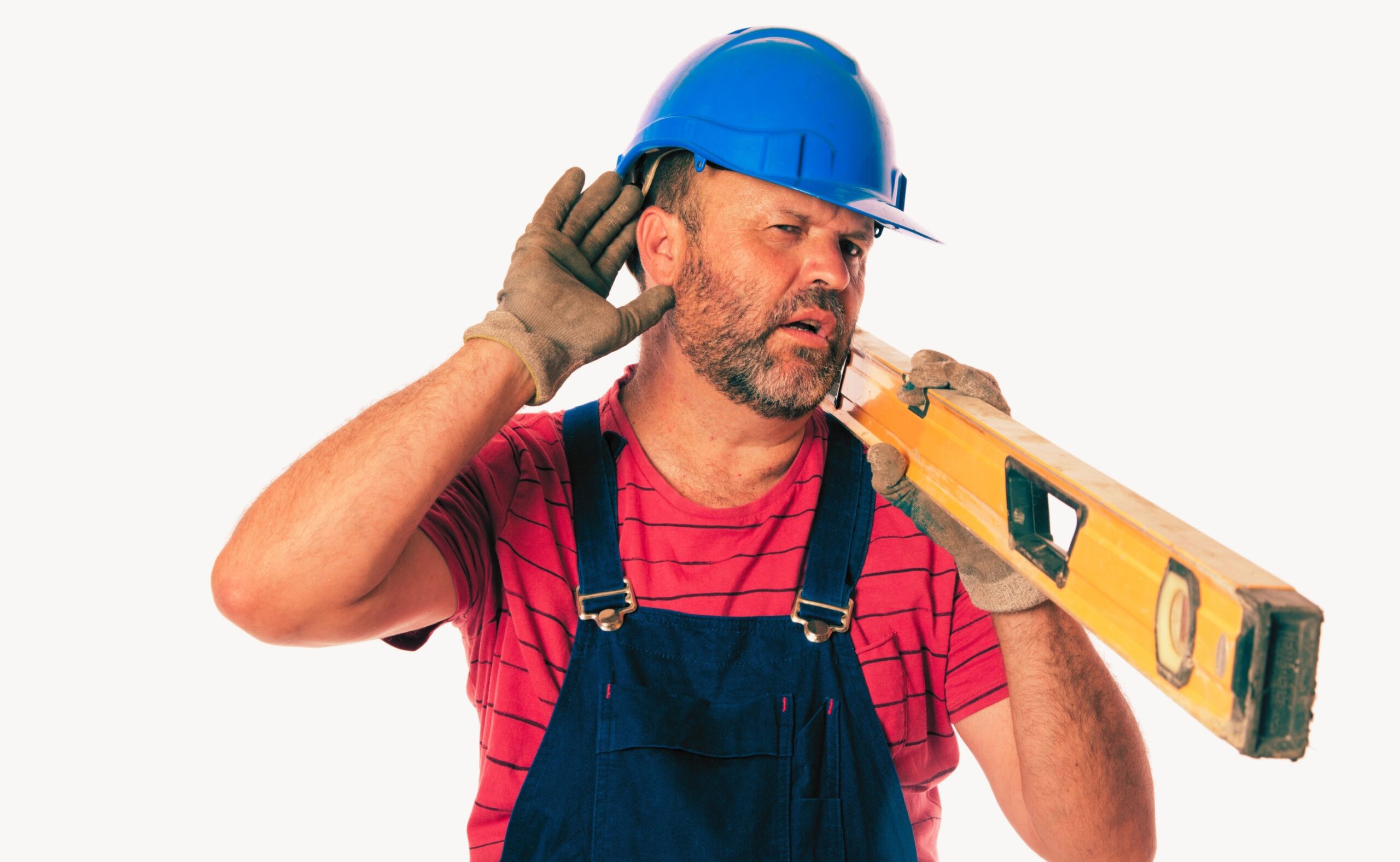 a worker holding hand to ear