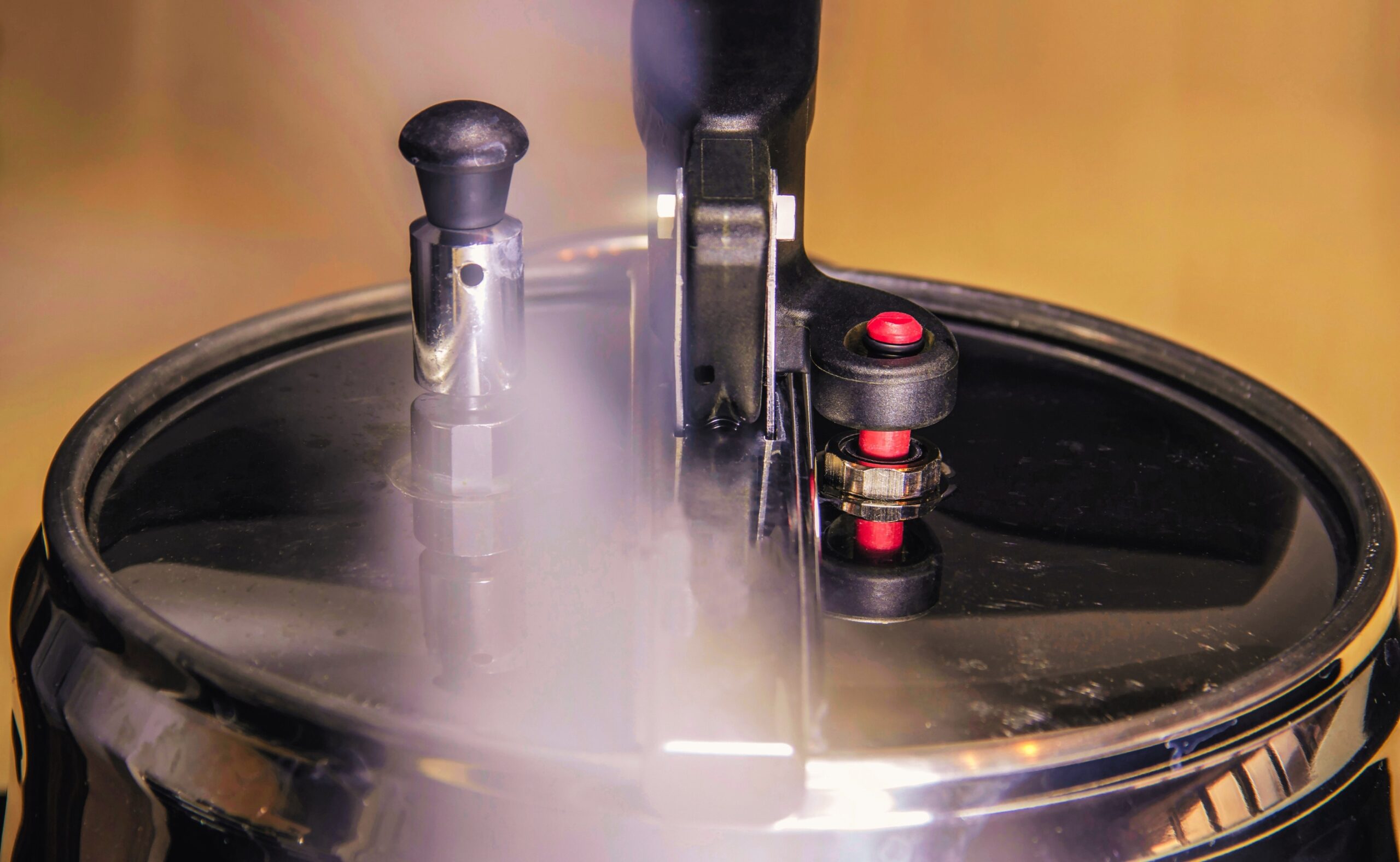 pressure cooker releasing hot steam