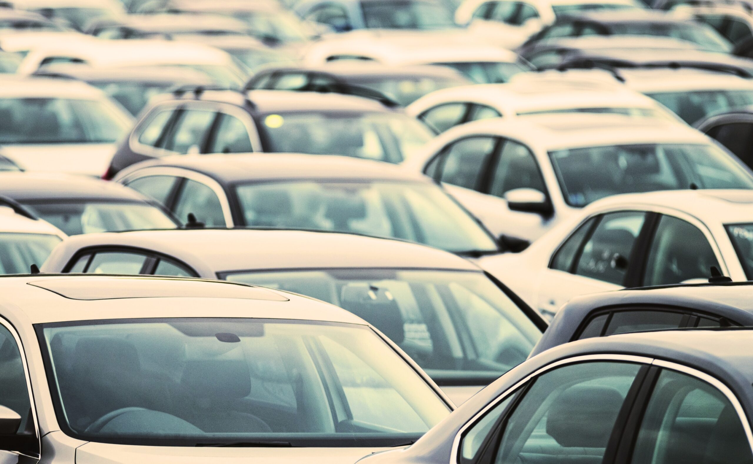 collection of cars on the road