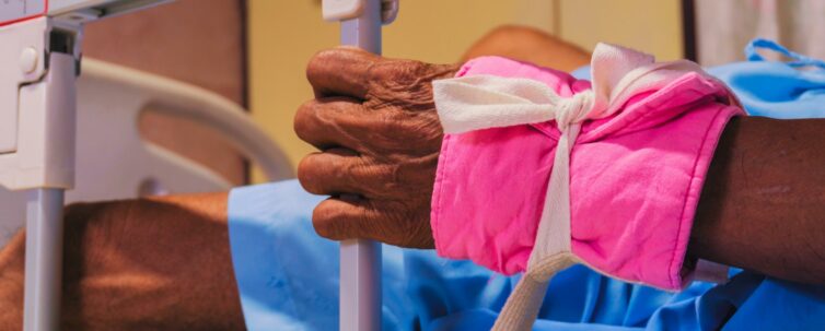 Crazy patient restrained on hospital bed