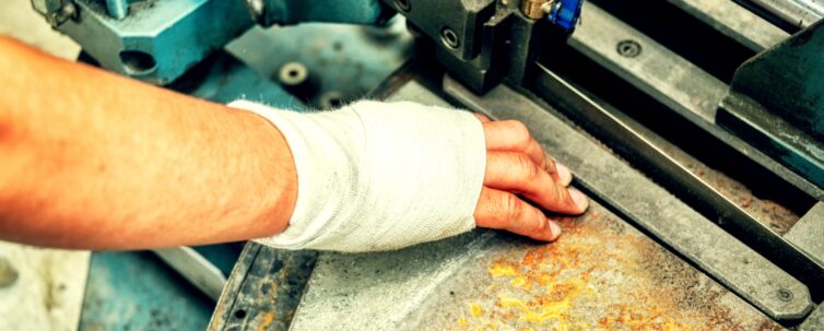 worker's hand with a bandage