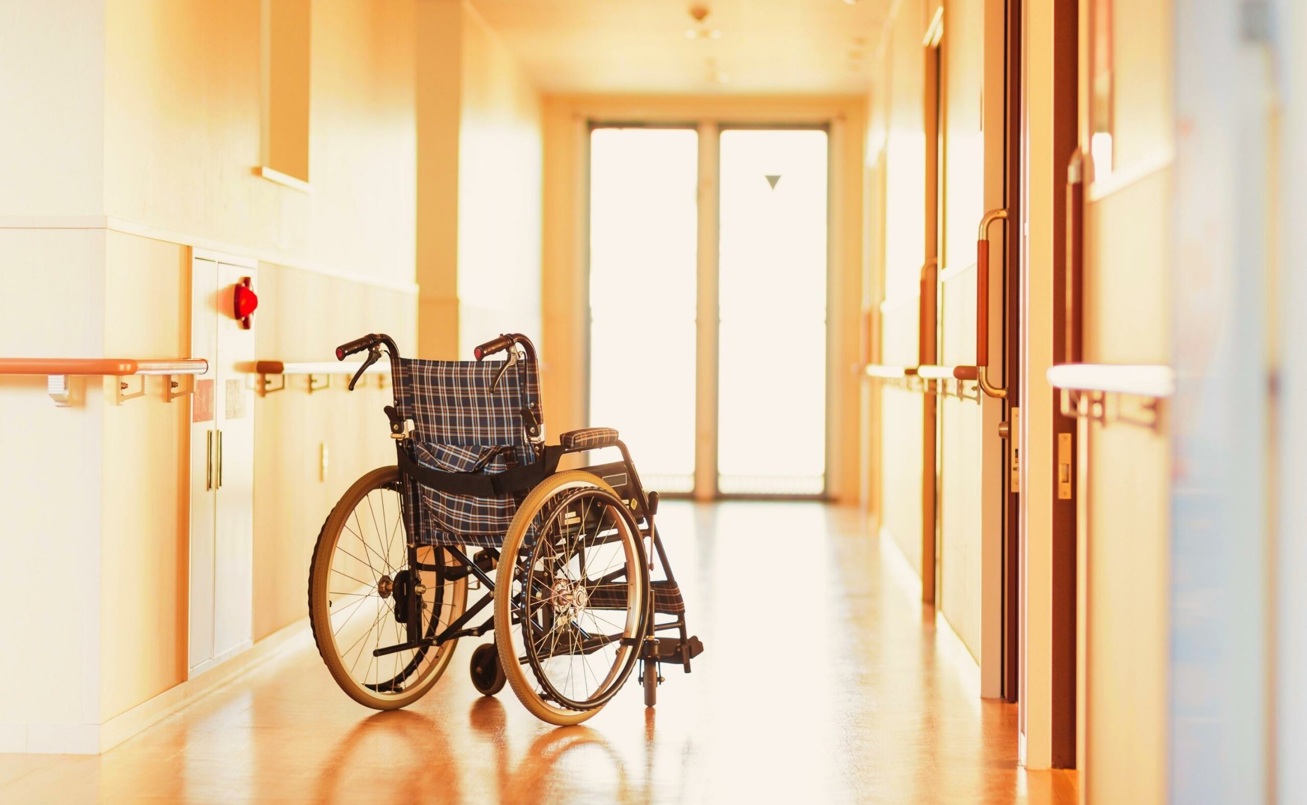 Wheelchair on hallway of nursing home