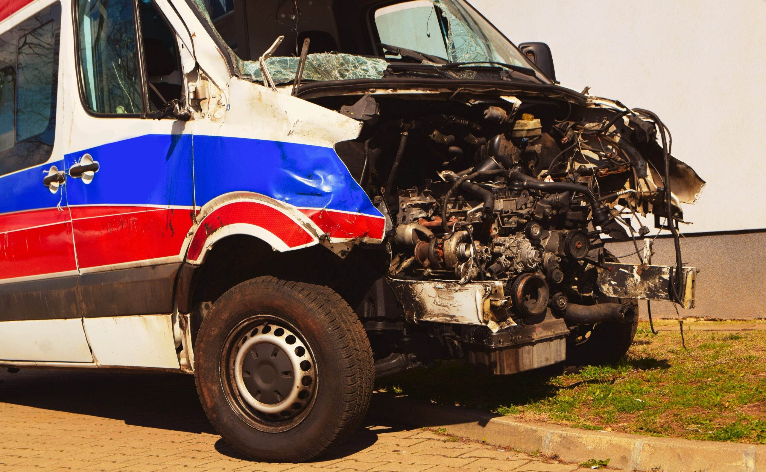 the front of the ambulance is crashed