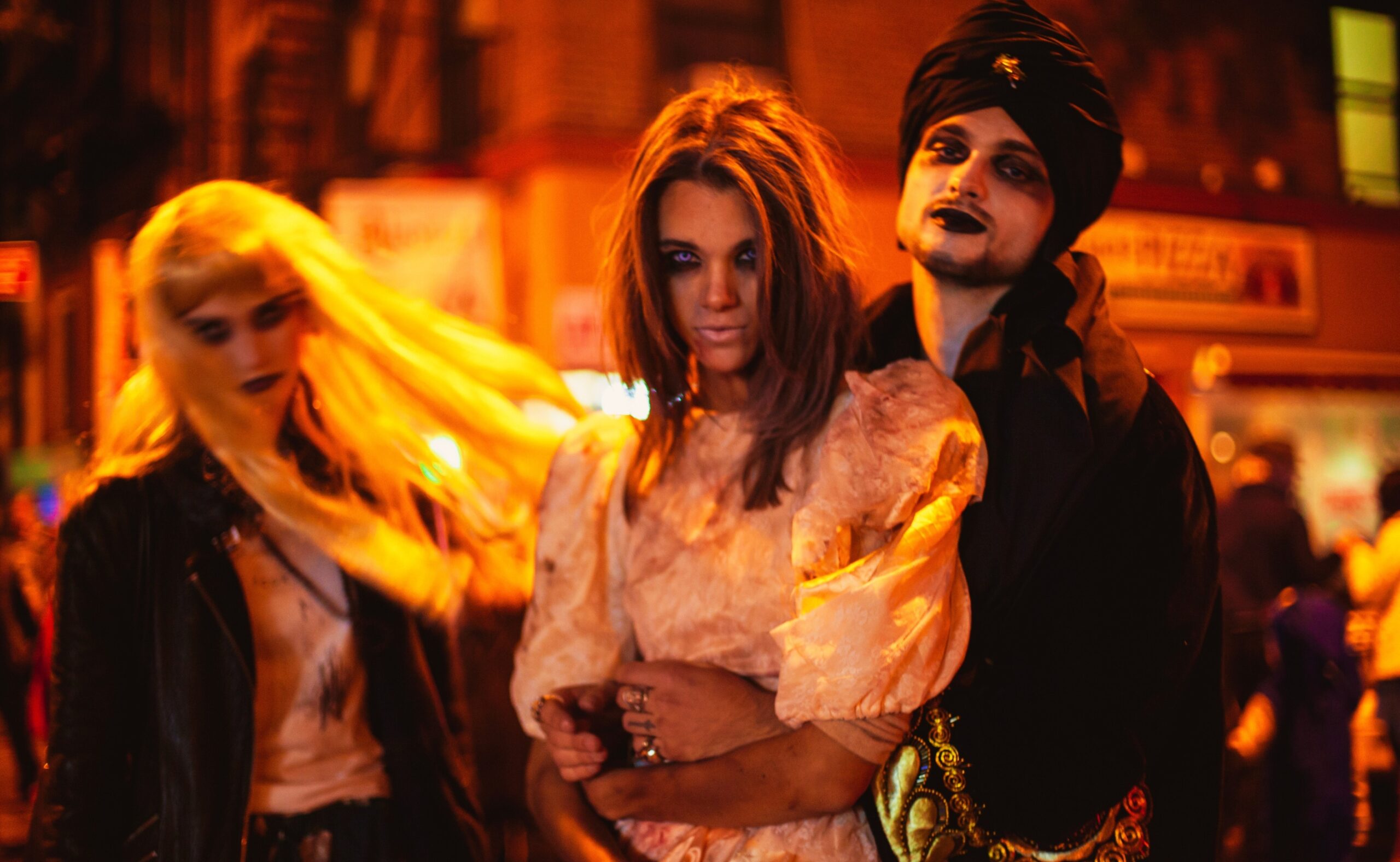 Group of people showcasing their Halloween costumes