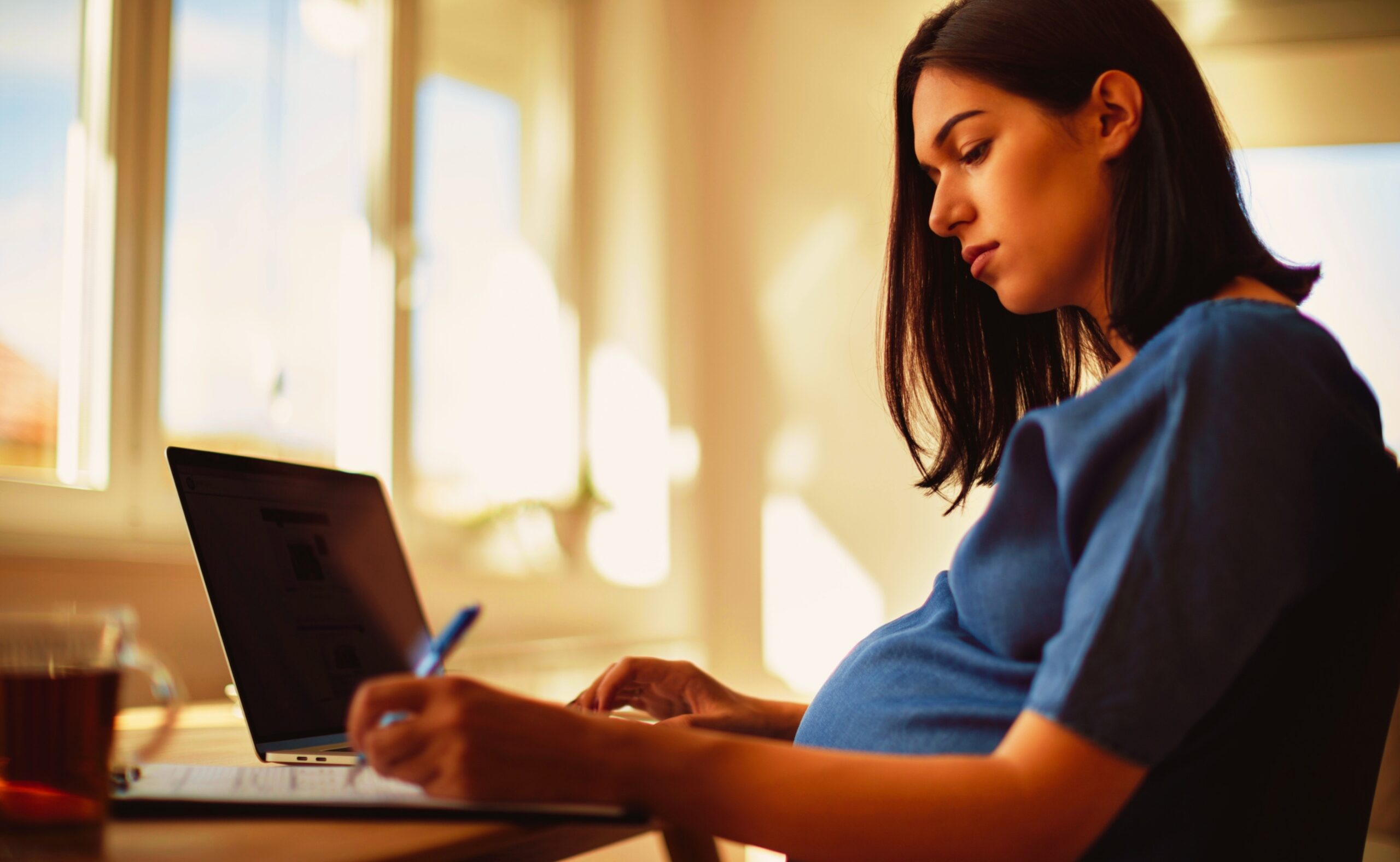 Pregnant woman working