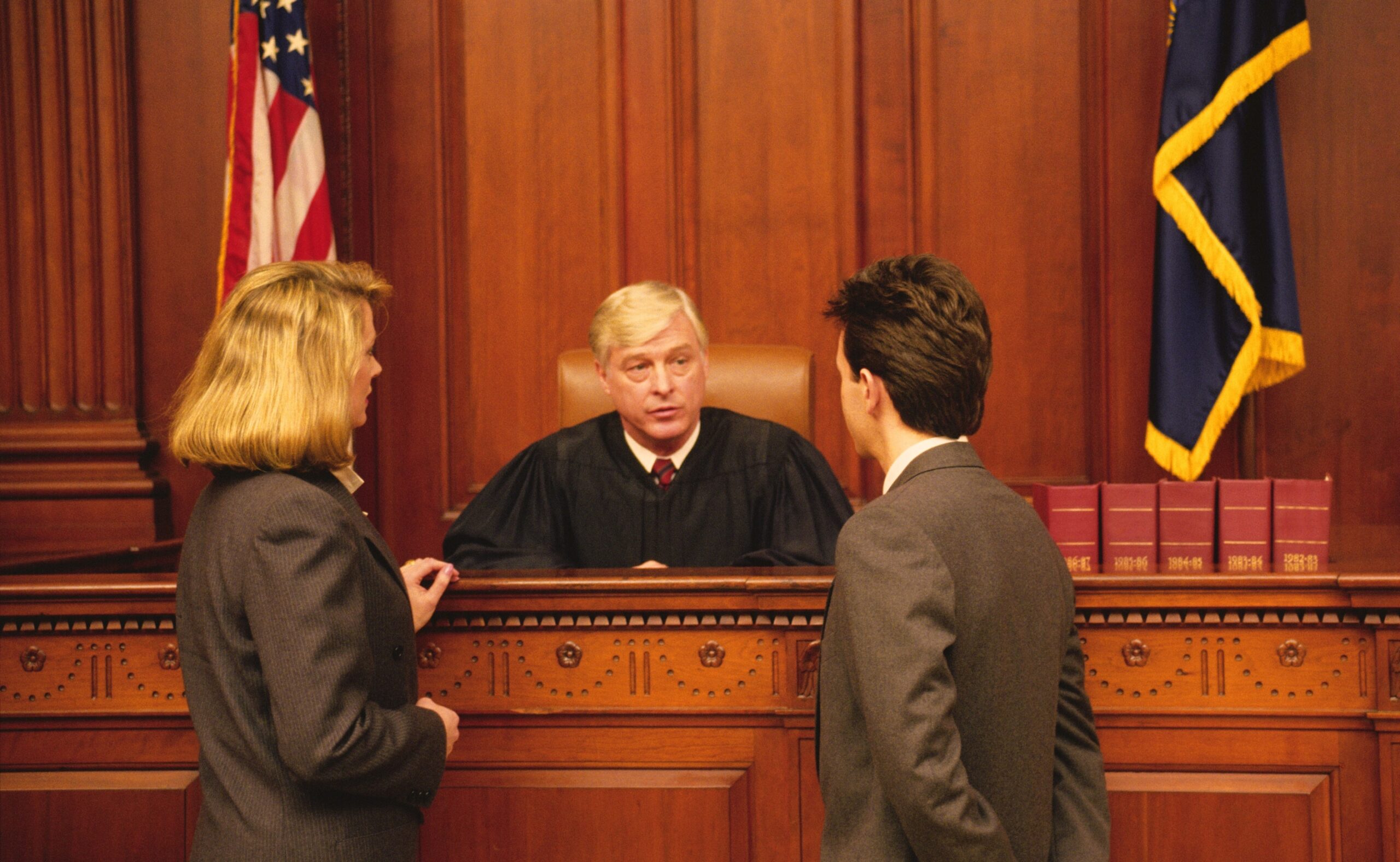Judge and lawyers in courtroom for deposition