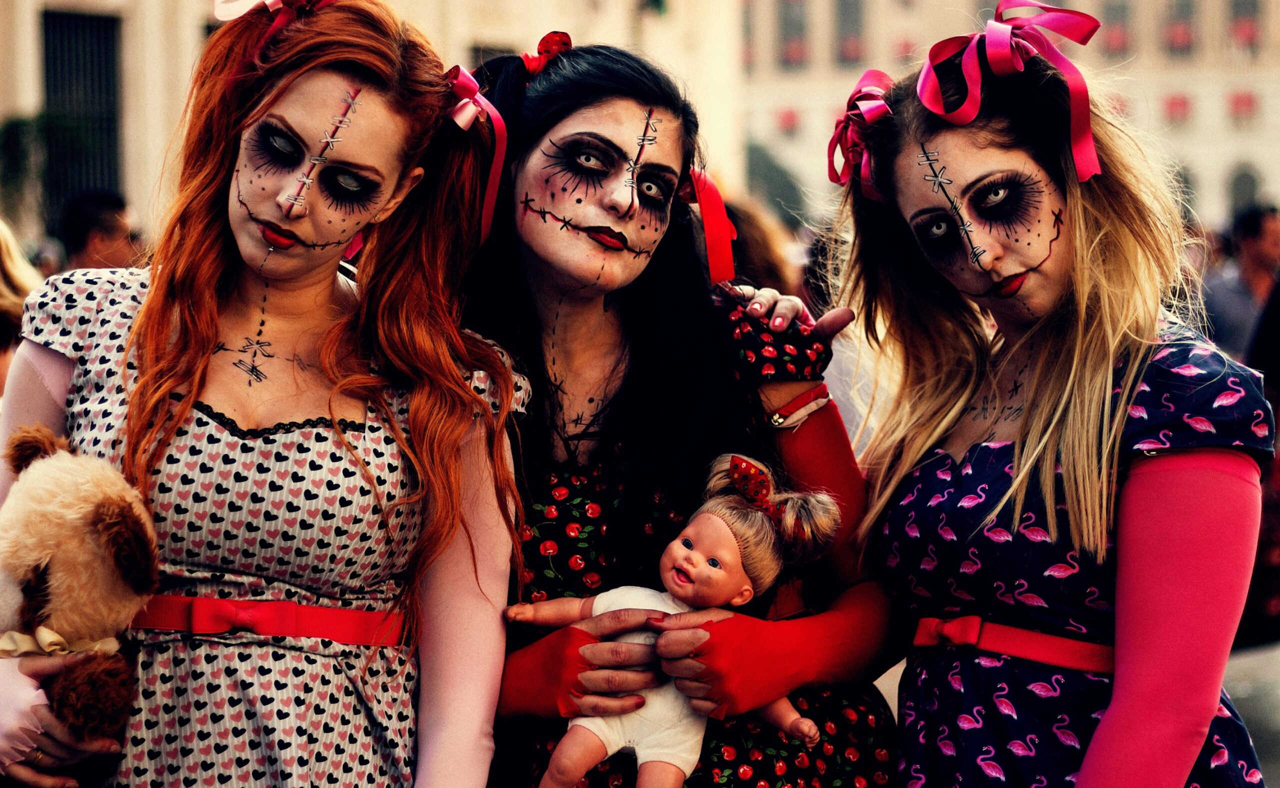 three women on Halloween costume ready for trick or treat