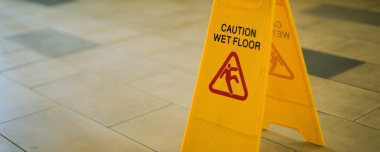 yellow wet floor sign