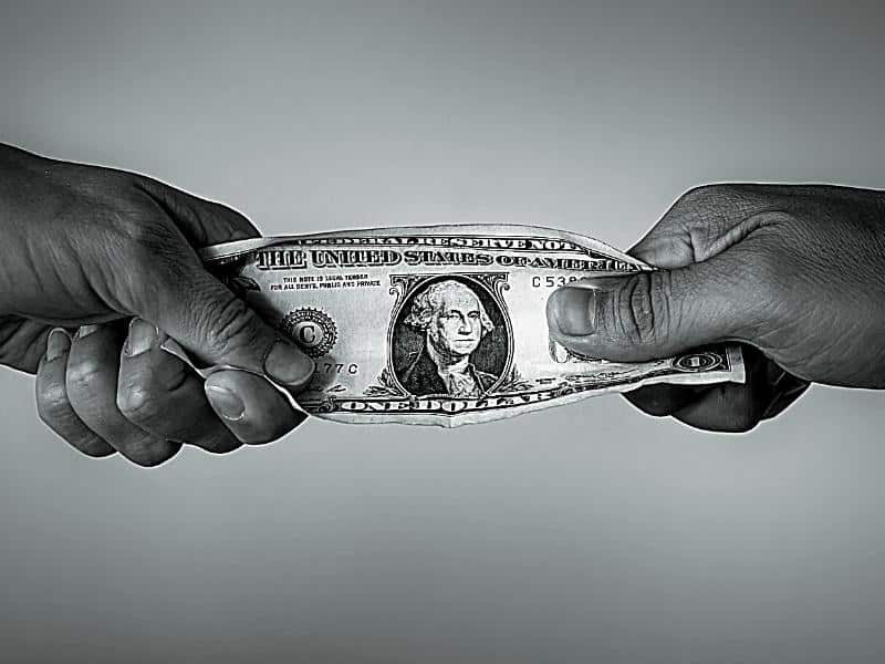 People fighting over money.